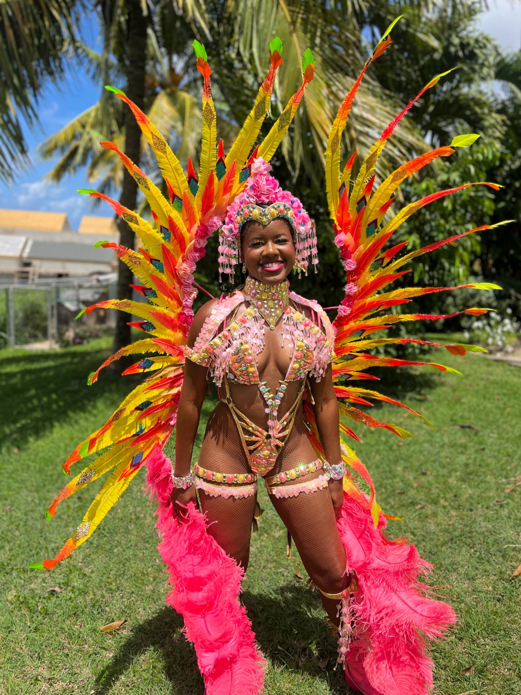 Caribbean girl in costume by Insane Carnival for Antigua's Carnival 2024